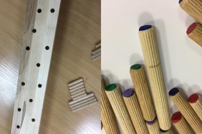 Spēles laukums un krāsainās dažādu garumu tapas